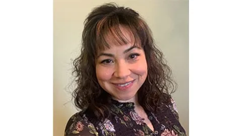 A portrait of Leslie M.