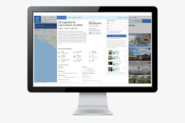 A property search portal powered by SpatialStream shown on a monitor.