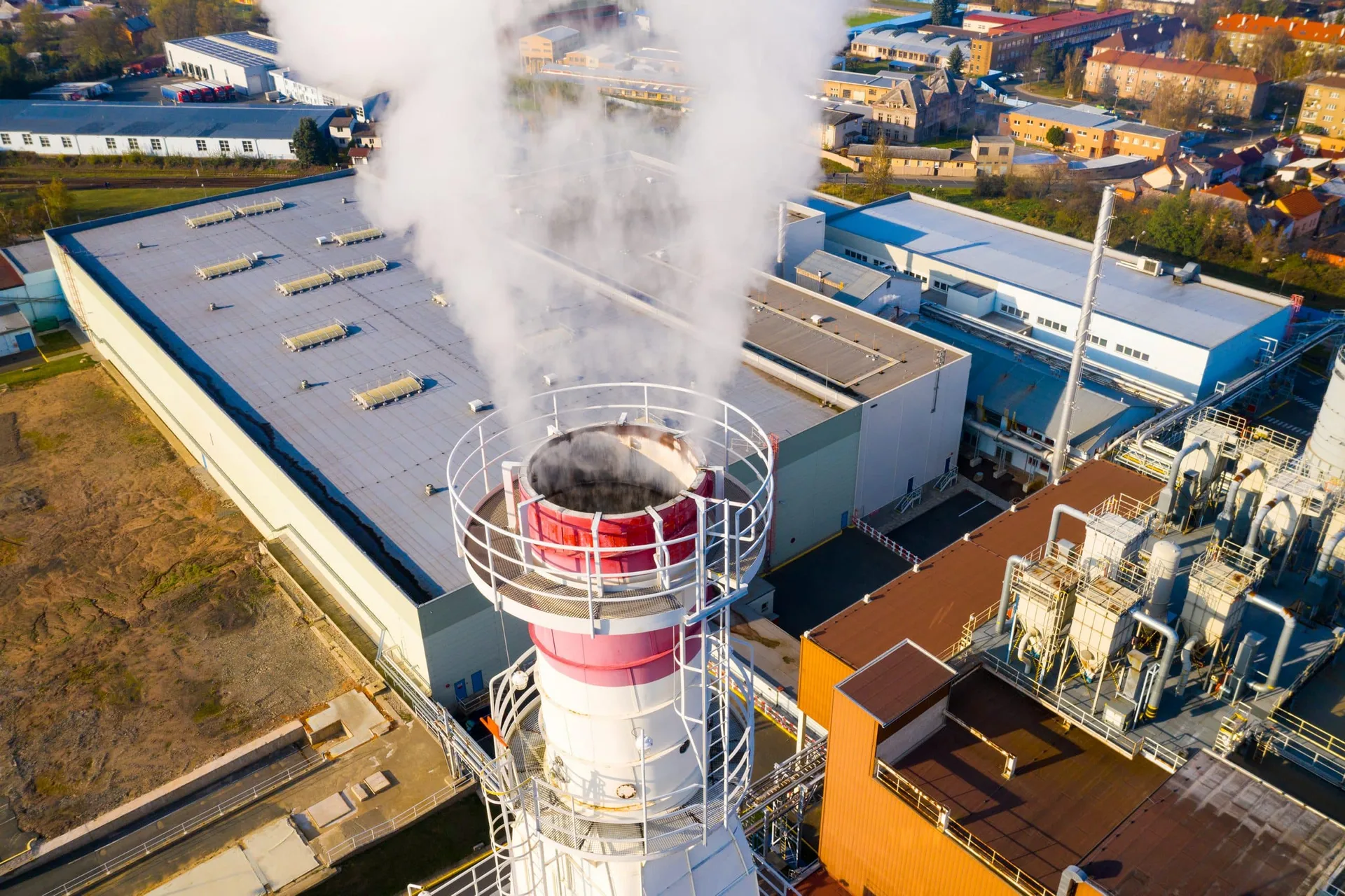 Aerial,View,To,Industrial,Area,With,Chemical,Plant.,Smoking,Chimney