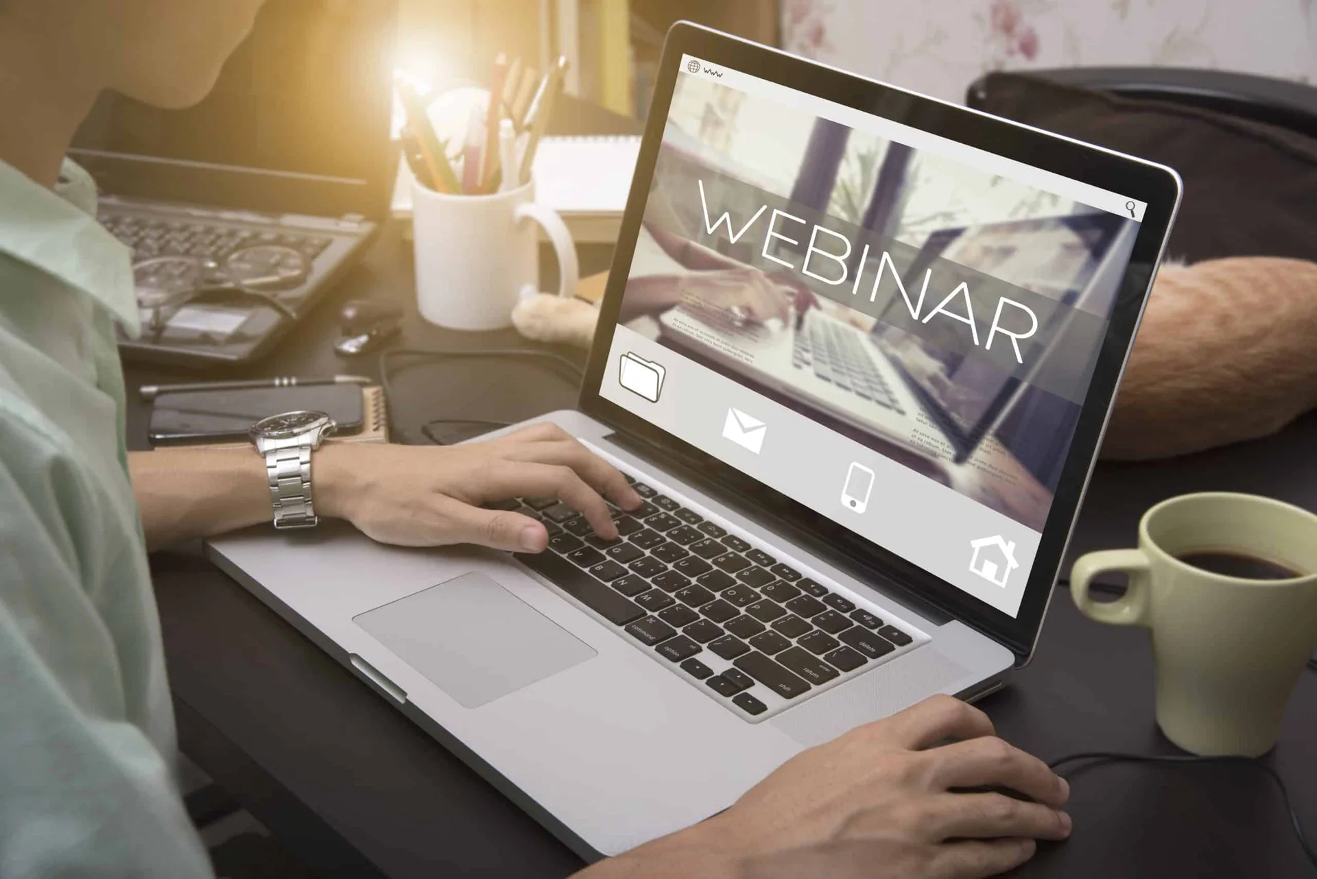 Business,Hand,Typing,On,A,Laptop,Keyboard,With,Webinar,Homepage