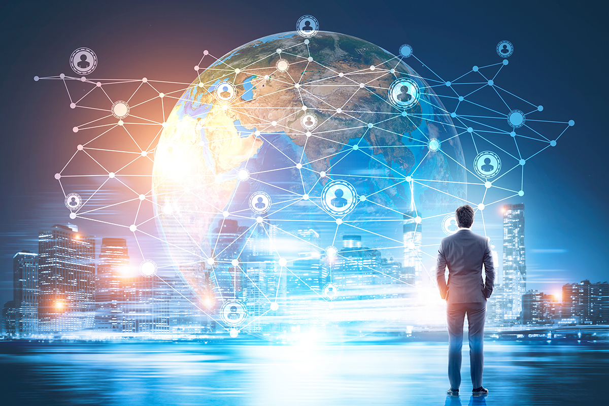 Rear view of a buisnessman looking at large Earth and network holograms in the air in front of him. Elements of this image furnished by NASA. Toned image. Double exposure